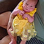 Amy joined the competition — help win amazing prizes! arm, baby, bow, child, clothing, couch, cute, daisies, holding, indoor, infant, legs, love, newborn, person, portrait, sitting, skin, soft, yellow_dress