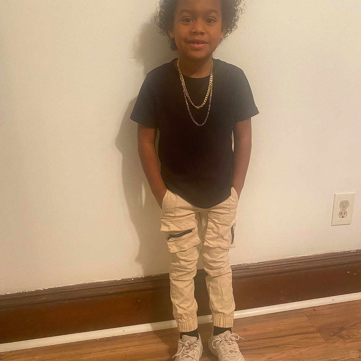 Jayden Dozier joined the competition — help win amazing prizes! accessories, boy, child, clothing, curlyhair, face, footwear, hair, happy, head, jewelry, male, necklace, pants, person, shoe, sitting, sleeve, sneaker, standing