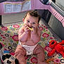 baby, bright, child, colorful, cute, diaper, elmo, floor, happy, indoors, infant, panda, patterned, play, playpen, plush_toy, sitting, smiling, teething_toy, toys