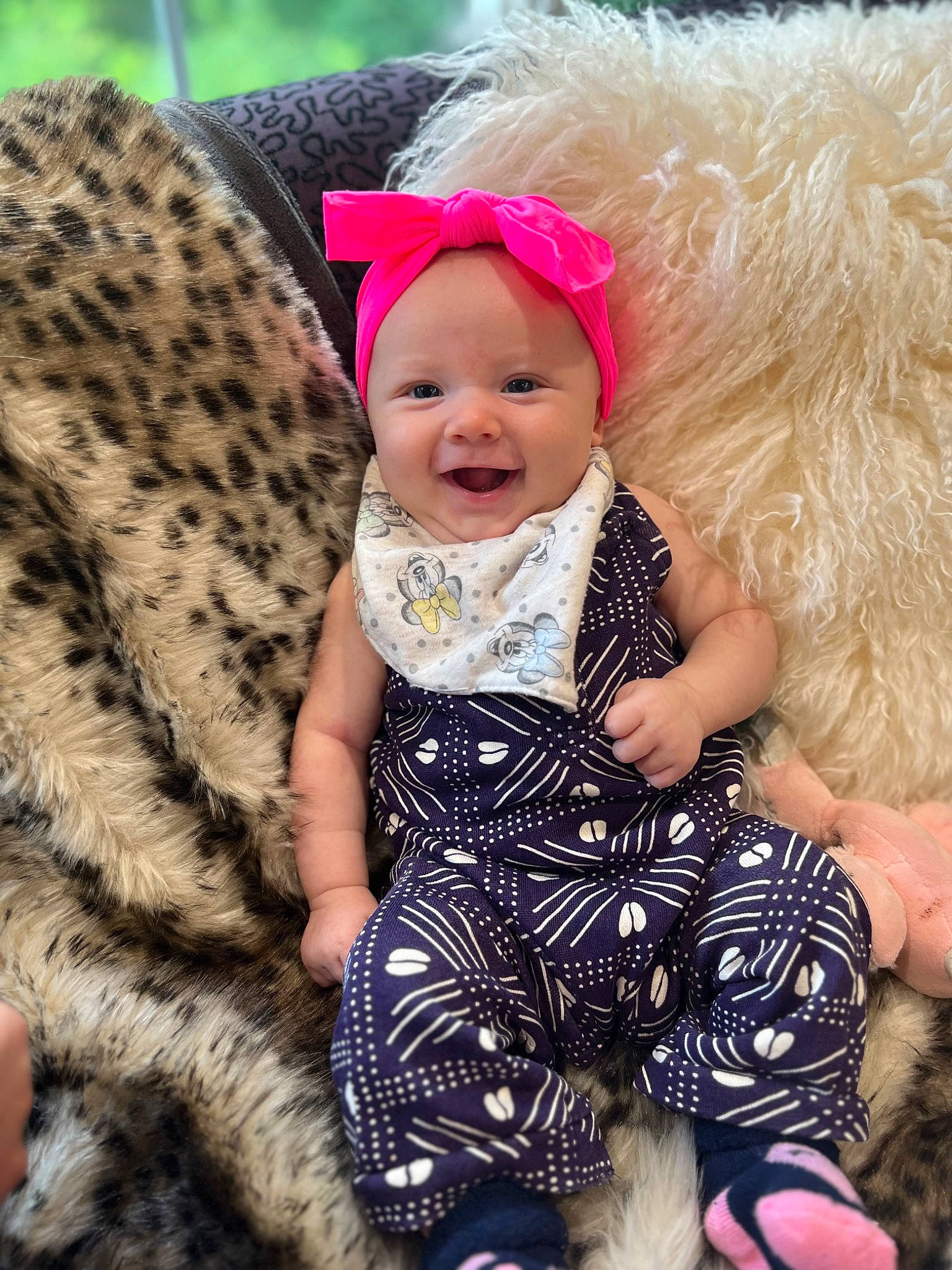 Myla is registered to the contest to win money with this photo: baby, baby_toddler_clothing, child, event, face, fashion_accessory, fun, fur, happy, headband, headwear, joy, magenta, pattern, people_in_nature, person, pink, purple, sitting, skin