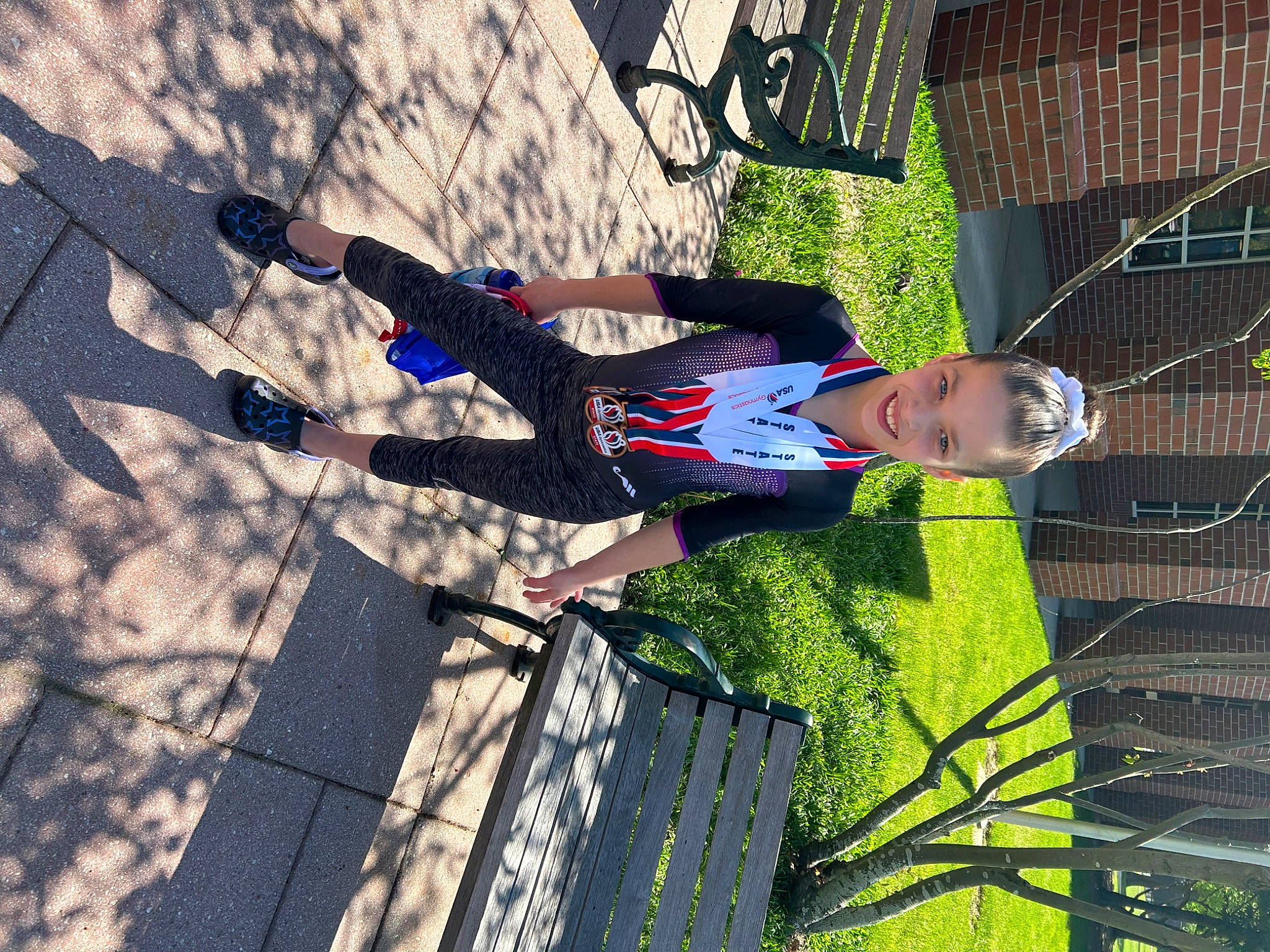 Lucy joined the competition — help win amazing prizes! electric_blue, fun, grass, hat, joy, leisure, mesh, people_in_nature, person, plant, recreation, shadow, tree, walking_shoe, wire_fencing, woody_plant