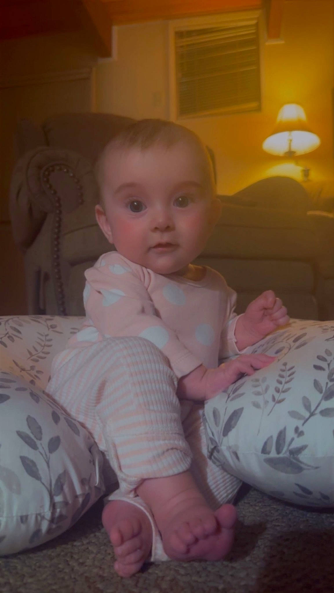 Sophia joined the competition — help win amazing prizes! baby, baby_toddler_clothing, cheek, child, comfort, finger, foot, human_leg, knee, lamp, lap, leg, mouth, person, pink, sitting, skin, sleeve, thigh, toddler