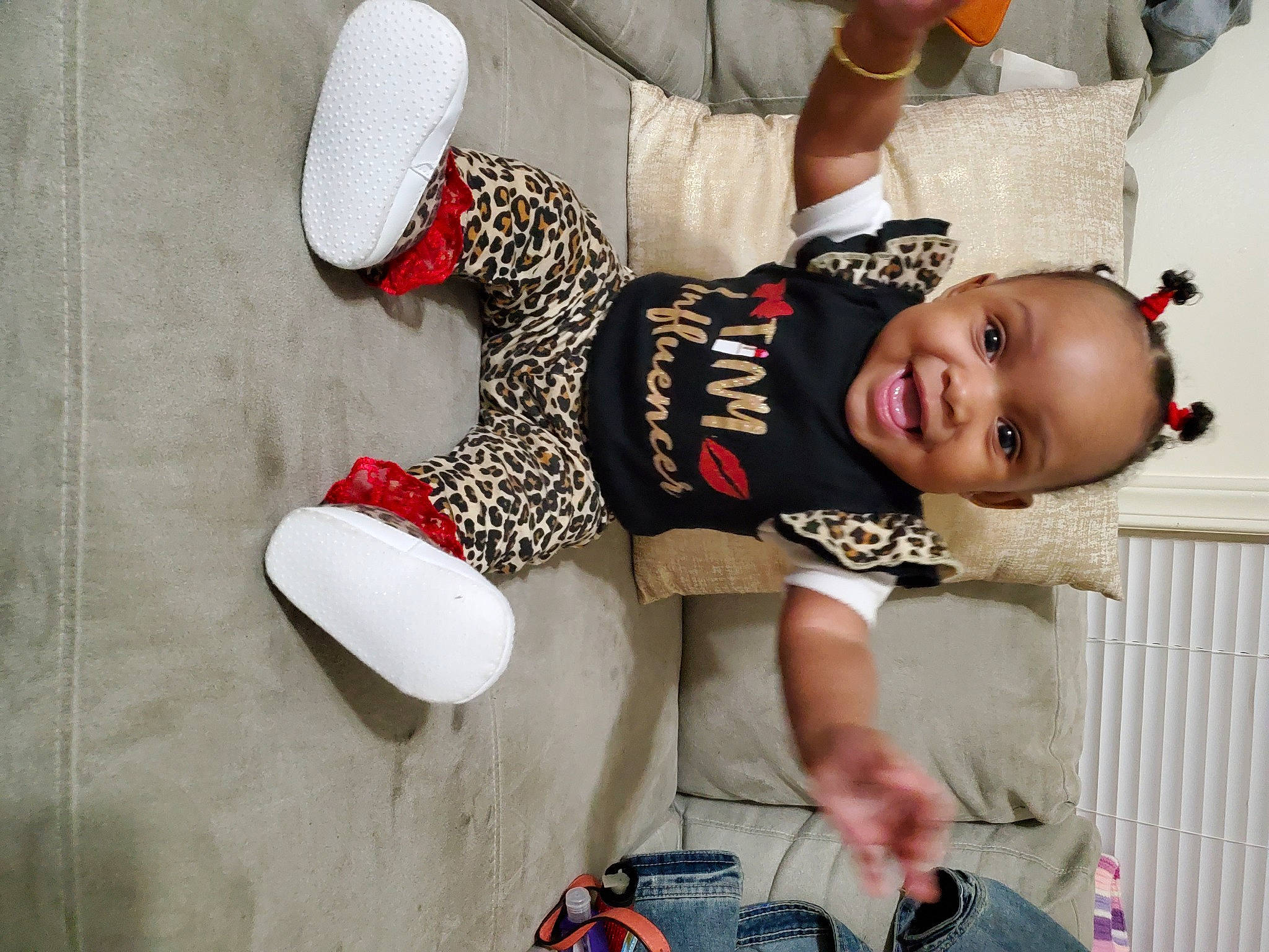 Devéyah joined the competition — help win amazing prizes! baby, baby_toddler_clothing, carmine, child, comfort, elbow, flooring, fun, happy, human_leg, knee, pattern, person, sitting, sleeve, smile, t_shirt, thigh, toddler, white