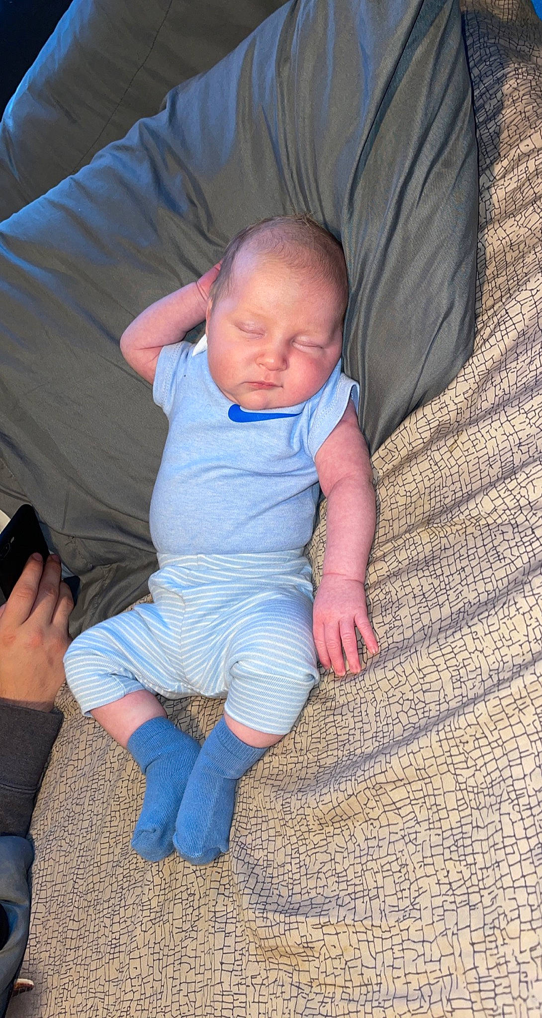 Gunnar joined the competition — help win amazing prizes! azure, baby, baby_toddler_clothing, cheek, child, comfort, couch, electric_blue, finger, foot, hand, lap, mammal, person, product, sitting, skin, sleeve, textile, thumb