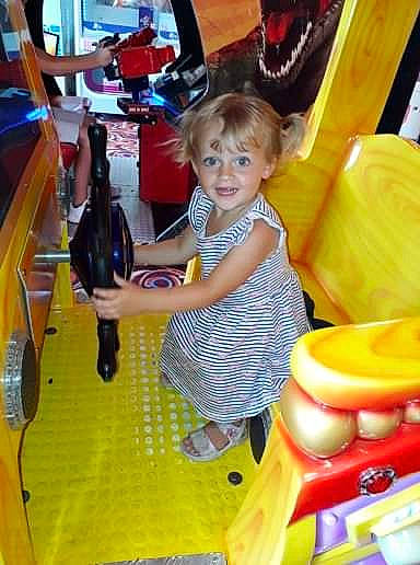 Layla-mae joined the competition — help win amazing prizes! amusement_park, amusement_ride, child, fun, games, joy, leisure, park, person, play, playground, playset, public_space, recreation, smile, toddler, vacation, yellow