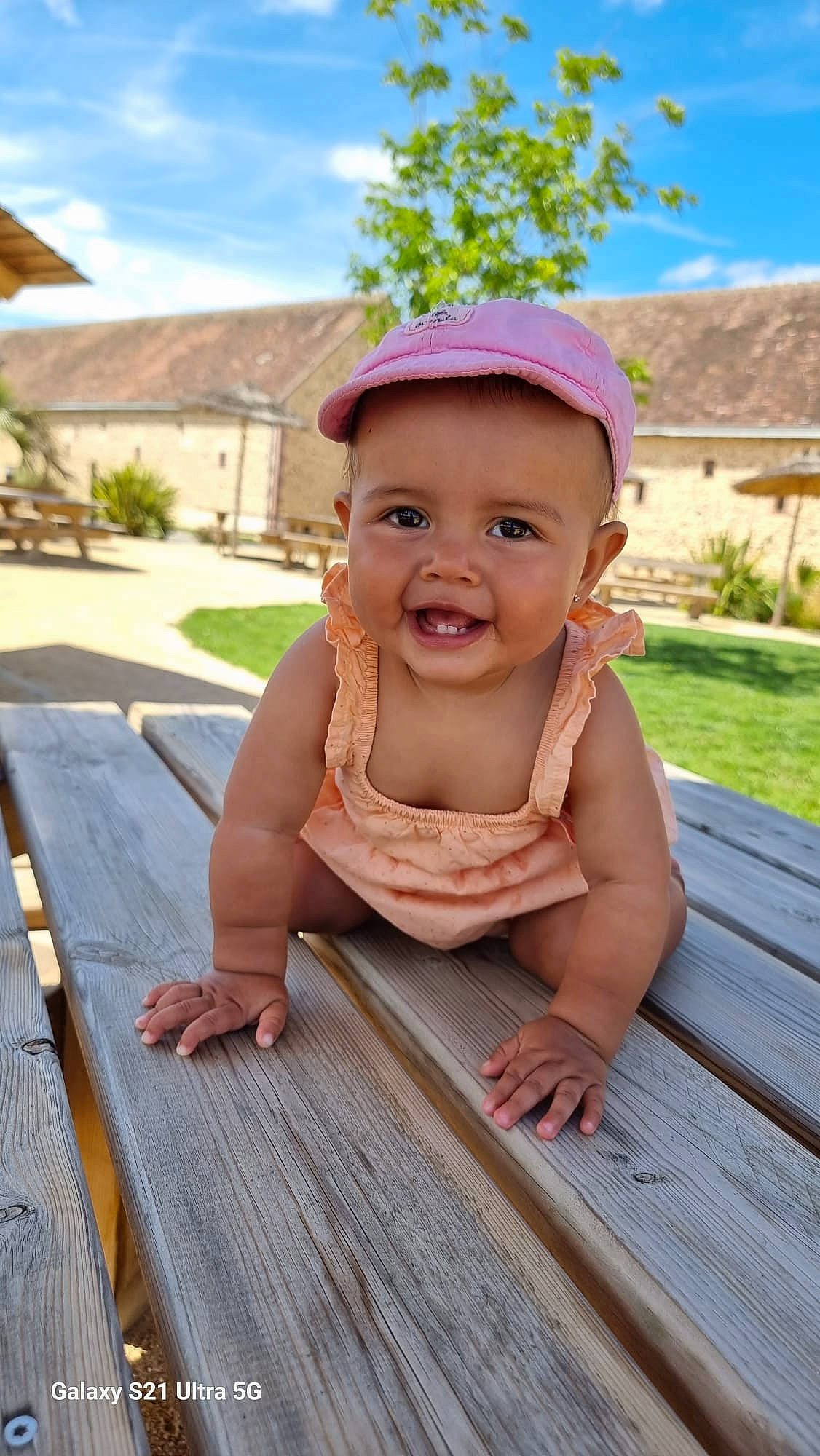 Juanita participe au concours pour gagner de l'argent avec cette photo : baby, baby_laughing, baby_toddler_clothing, child, cloud, flooring, fun, grass, happy, hardwood, joy, leisure, person, plant, recreation, skin, sky, smile, summer, toddler