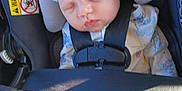Mivah joined the competition — help win amazing prizes! baby, sleeping, car_seat, child, infant, knit_hat, pajamas, safety_harness, seatbelt, hand, face, peaceful, indoors, sunlight, closeup, cute, child_safety, transportation, car_interior, resting