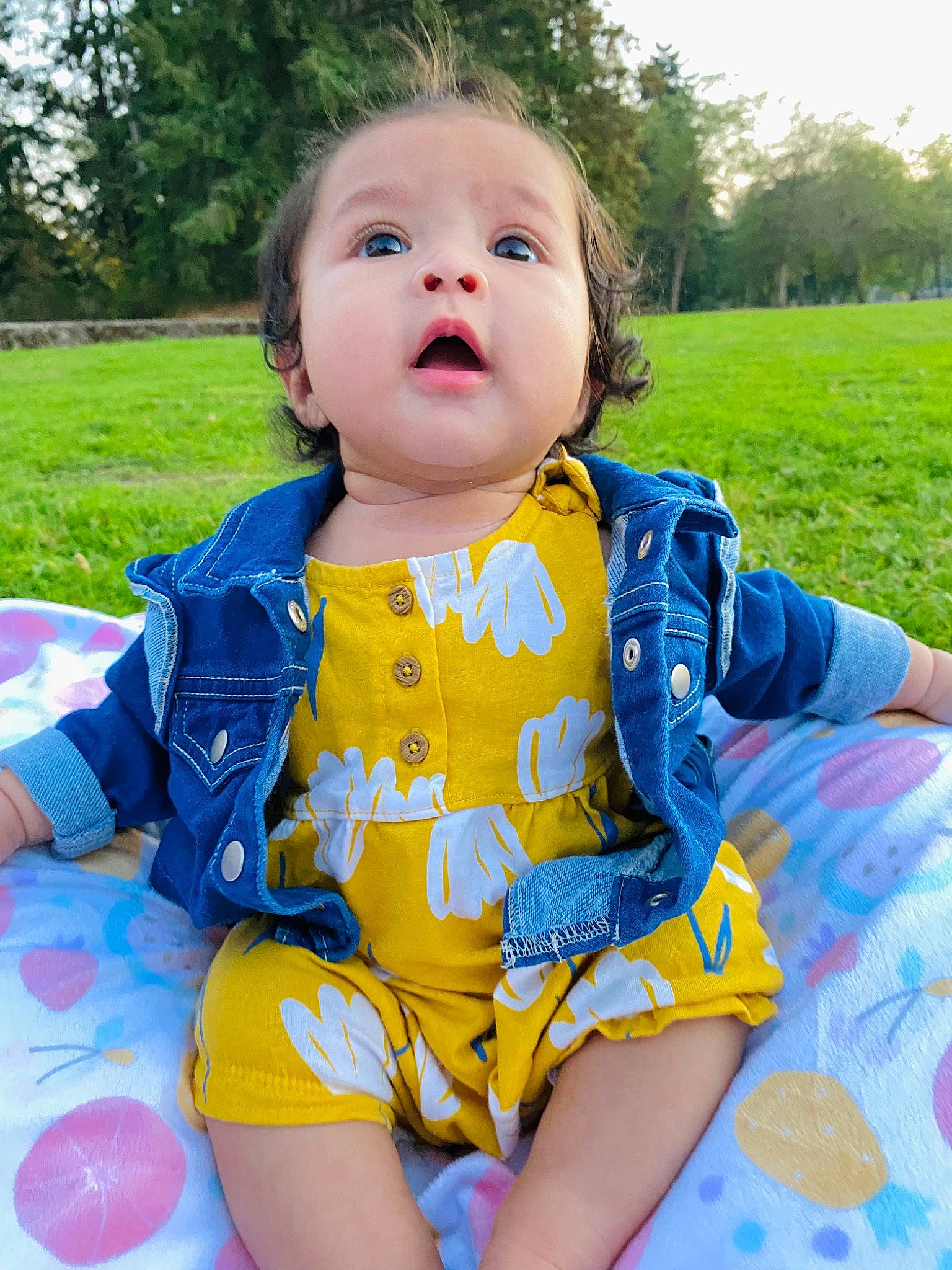 Alaina joined the competition — help win amazing prizes! baby, baby_toddler_clothing, child, dress, eye, face, facial_expression, fun, grass, happy, leisure, pattern, person, pink, plant, sitting, skin, sleeve, summer, surprise
