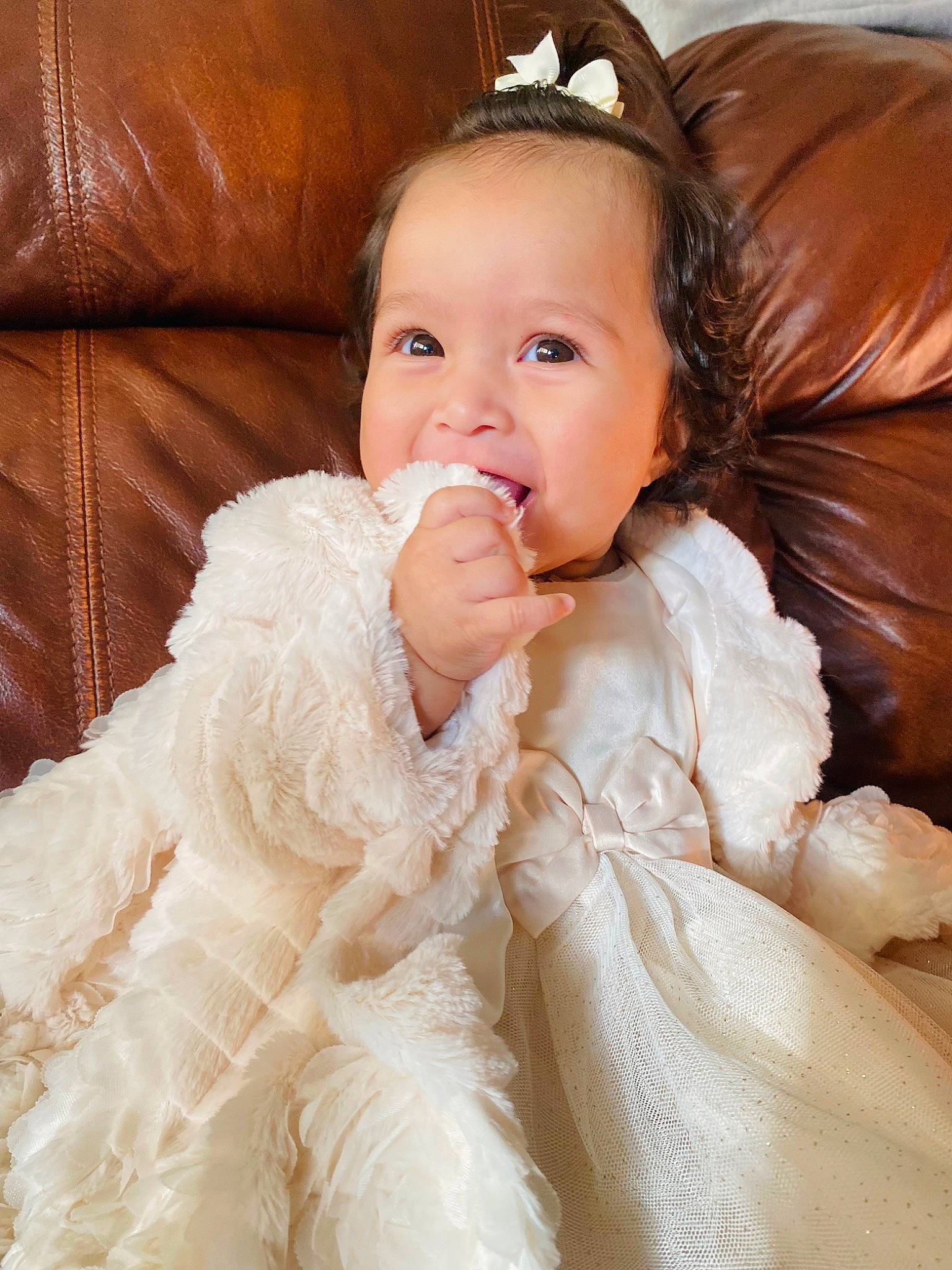 Alaina is registered to the contest to win money with this photo: baby_toddler_clothing, bridal_accessory, comfort, ear, event, fashion_accessory, flash_photography, fur, fur_clothing, gesture, hair, happy, head, headpiece, iris, long_hair, person, sleeve, smile, textile