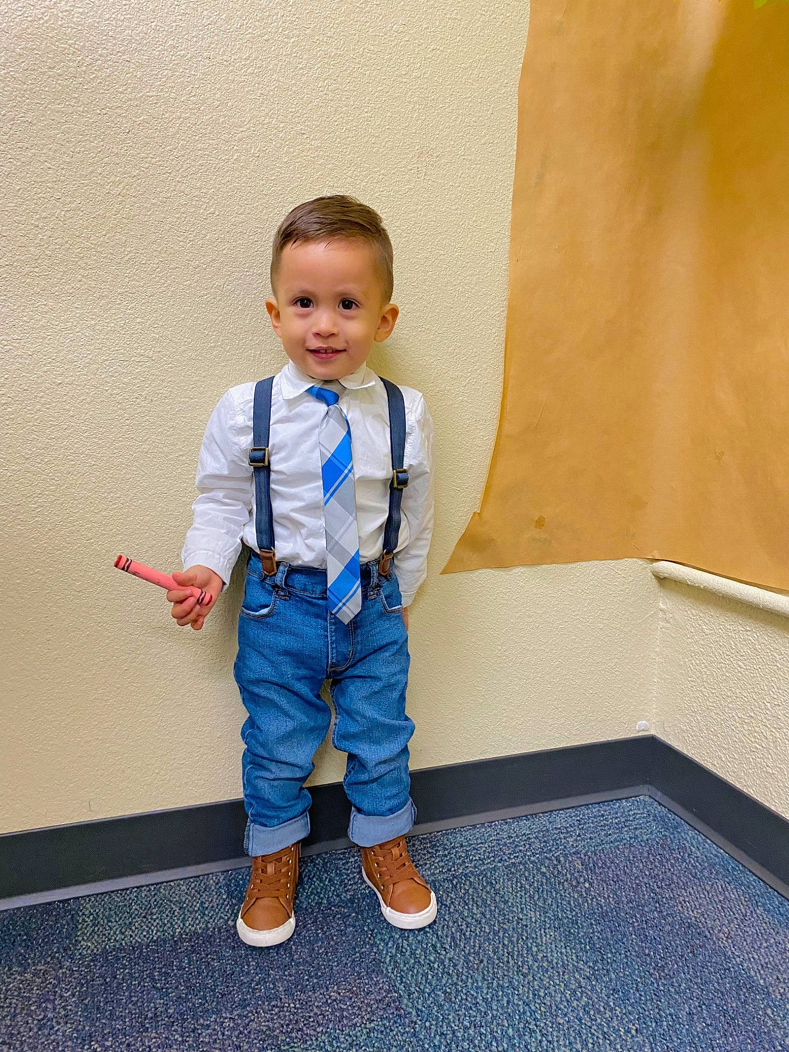 Mateo is registered to the contest to win money with this photo: baby_toddler_clothing, child, denim, door, electric_blue, floor, flooring, formal_wear, fun, gesture, happy, human_leg, joy, leg, leisure, person, room, sleeve, smile, stairs