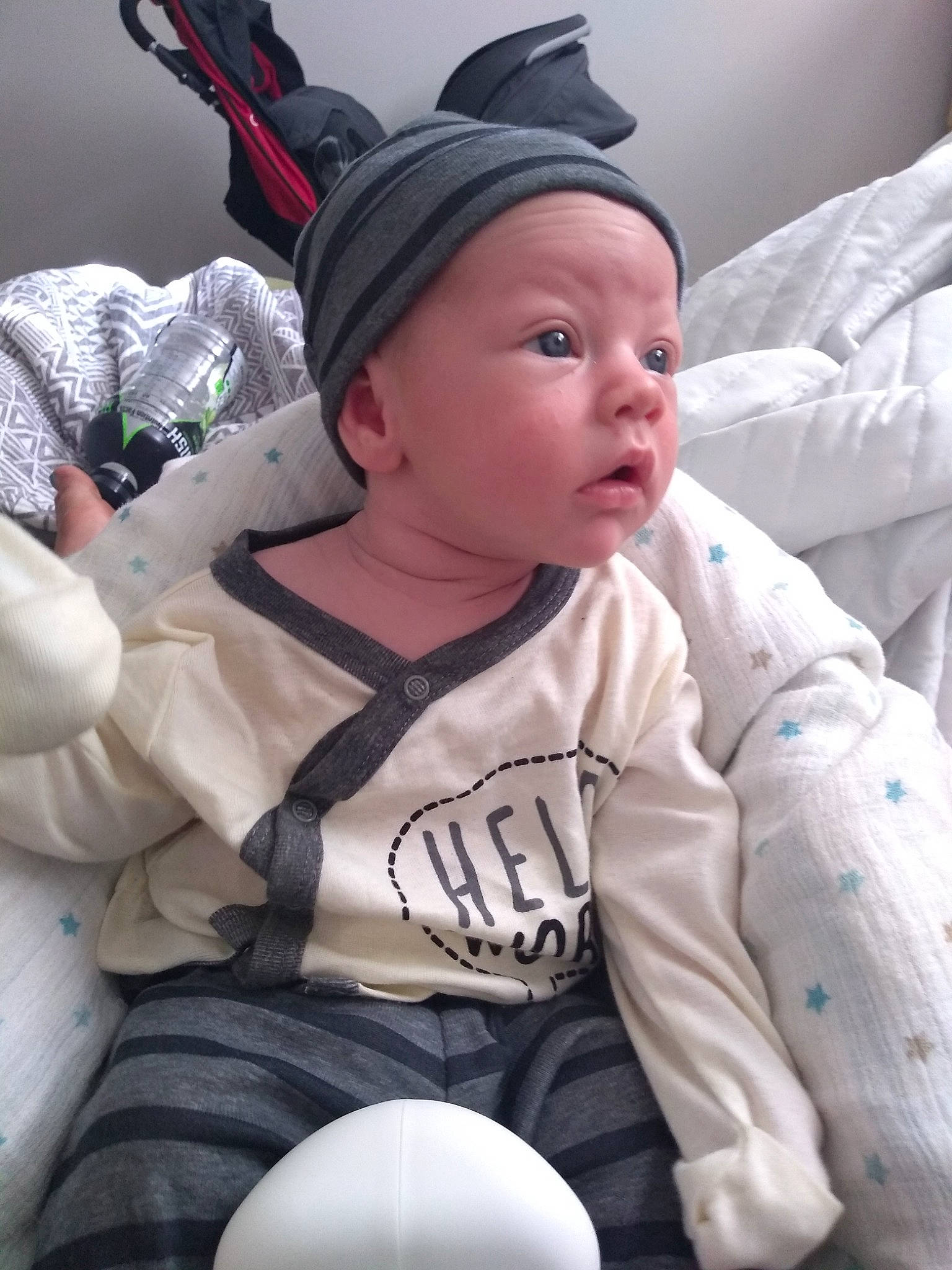 Kayne is registered to the contest to win money with this photo: baby, child, headgear, headwear, person, sleeve, smile, toddler