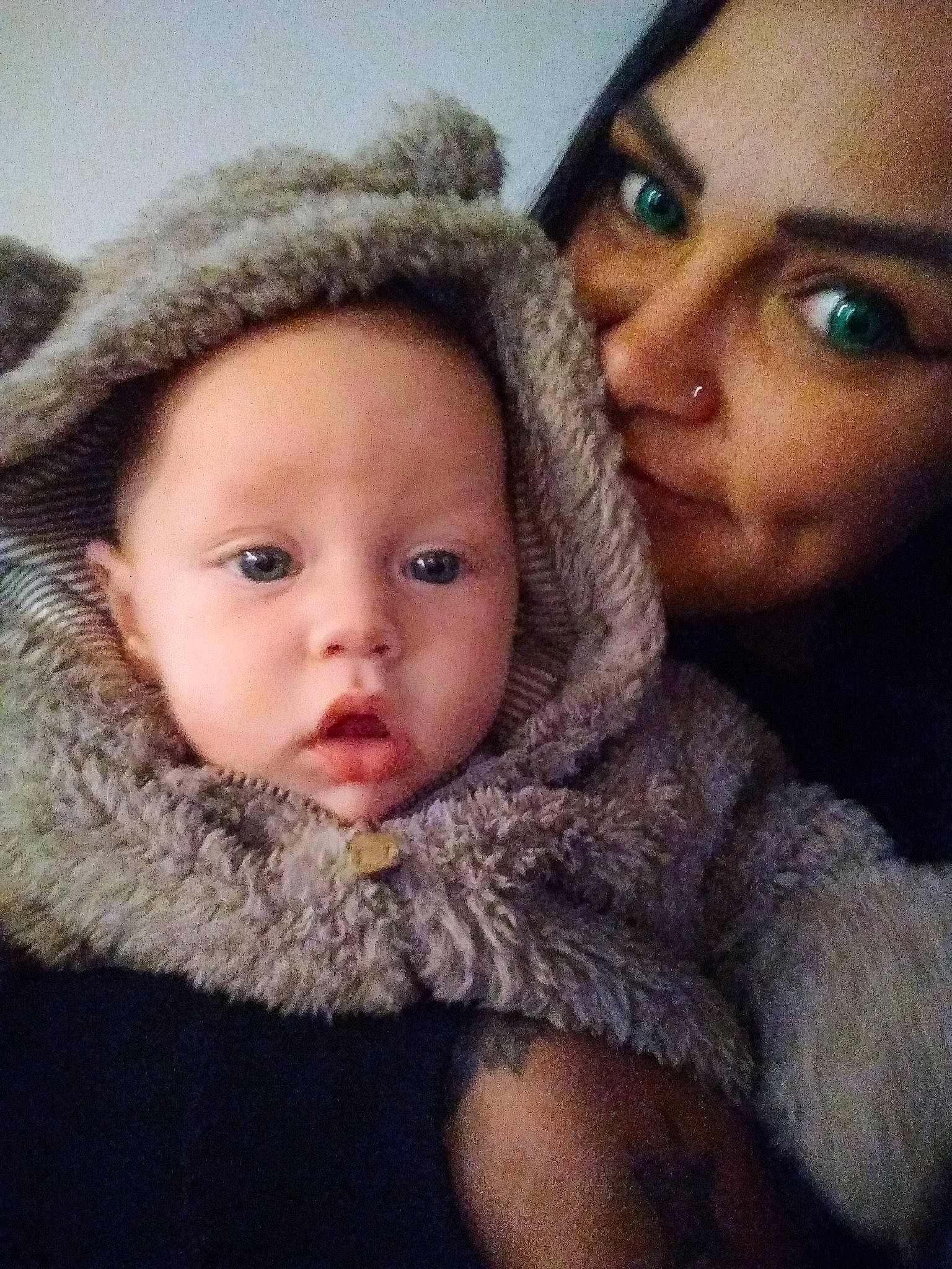 Kayne is registered to the contest to win money with this photo: baby, cheek, child, ear, eye, eyebrow, face, forehead, fur, fur_clothing, head, headgear, iris, lip, nose, person, photography, selfie, skin, surprise