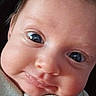 Winslow is registered to the contest to win money with this photo: baby, face, closeup, infant, cheeks, eyes, blanket, soft, portrait, cute, newborn, child, expression, skin, young, person, head, smile, cozy, indoors