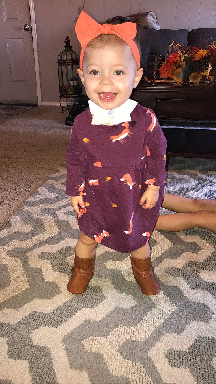 Lynlee joined the competition — help win amazing prizes! child, costume, dress, event, face, fashion_accessory, fashion_design, flooring, formal_wear, fun, happy, head, joy, leg, orange, pattern, person, sandal, skin, sleeve