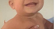 Caizyen is registered to the contest to win money with this photo: baby, smiling, child, hand, skin, portrait, happy, cute, infant, person, face, naked_torso, holding, adult_hand, indoor, people, closeup, human, young, expression