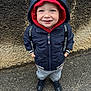 Télio a rejoint le concours — aidez-le/la à gagner de superbes lots ! casual_clothing, child, cute, face, happy, hoodie, jacket, mickey_mouse, outdoor, pants, pavement, portrait, red_hood, shoes, smiling, standing, suspenders, toddler, wall, young_child