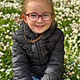Emmy participe au concours pour gagner de l'argent avec cette photo : black_jacket, casual, child, cute, daylight, field, flowers, girl, glasses, grass, greenery, hair, happy, nature, outdoor, portrait, sitting, smiling, spring, young