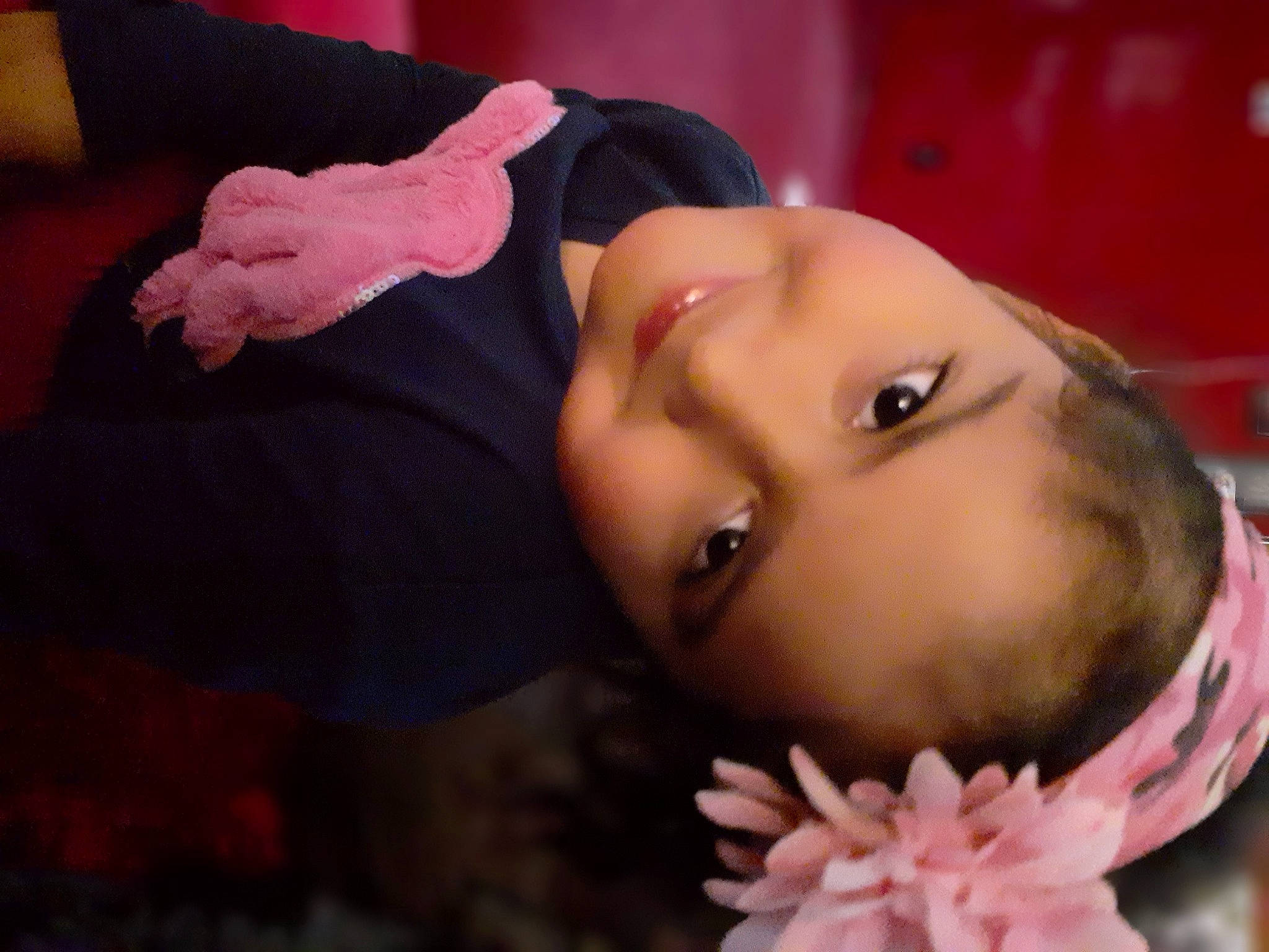 Miah is registered to the contest to win money with this photo: baby, beauty, black_hair, cheek, child, ear, eye, face, hand, head, joy, lip, mouth, neck, nose, person, photography, pink, skin, toddler