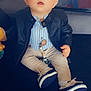 Eden participe au concours pour gagner de l'argent avec cette photo : baby, child, glasses_filter, leather_jacket, striped_shirt, pacifier_clip, shoes, sitting, indoor, cute, young_child, face, expression, toy, floor, clothing, portrait, casual, fashion, accessory