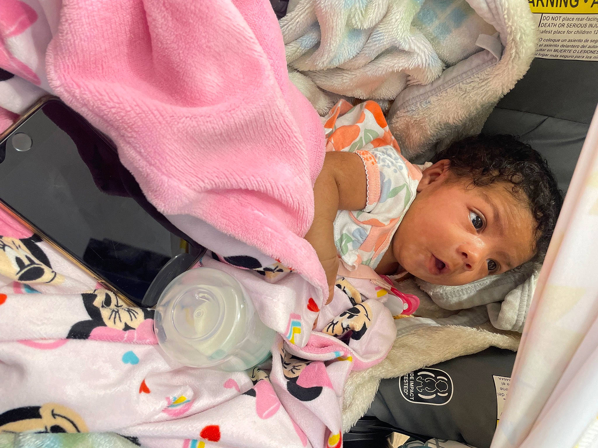 Amani is registered to the contest to win money with this photo: baby, baby_carriage, baby_products, baby_safety, baby_toddler_clothing, car_seat, cheek, child, comfort, eye, eyelash, linens, magenta, nail, pattern, person, pink, skin, textile, toddler