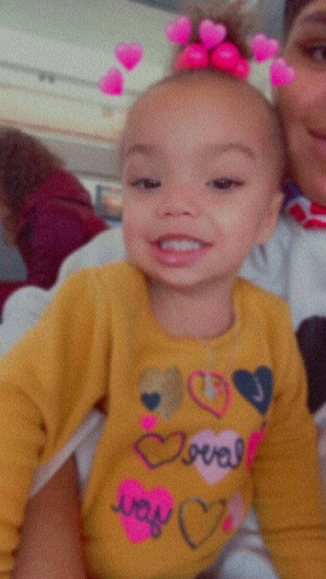 Nyazia is registered to the contest to win money with this photo: baby_toddler_clothing, cheek, chin, ear, eye, eyebrow, facial_expression, forehead, hairstyle, happy, head, human_body, joy, lip, mouth, nose, organ, person, product, skin