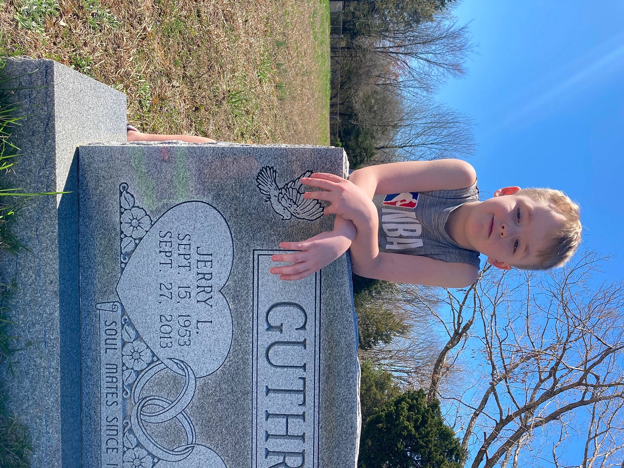 Braiden is registered to the contest to win money with this photo: art, concrete, daytime, elbow, font, fun, grass, handwriting, leisure, line, number, people_in_nature, person, plant, rock, sky, spring, tree, visual_arts, woody_plant