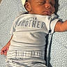 baby, sleeping, infant, hat, clothing, striped_pants, blanket, blue, cute, peaceful, face, newborn, child, person, soft, resting, little_brother, toddler, indoors, cozy