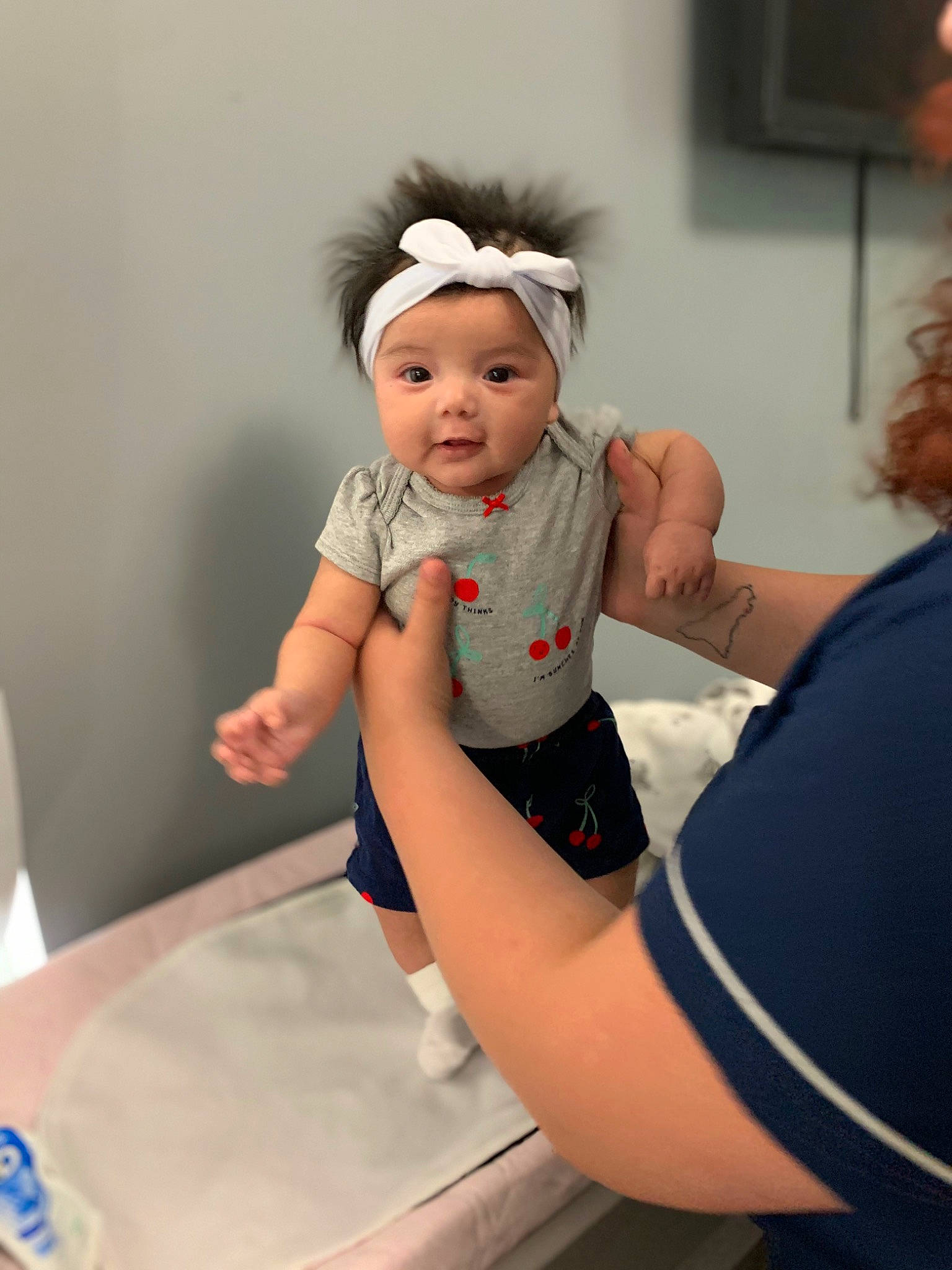 Celeste is registered to the contest to win money with this photo: arm, baby, bathing, birth, child, ear, finger, hand, headwear, leg, person, toddler