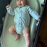 Rhett joined the competition — help win amazing prizes! baby, infant, onesie, bathtub, bath, child, smiling, tongue_out, happy, skin, legs, arm, wooden_floor, baby_bath, buttoned_clothing, person, indoor, cute, playful, newborn