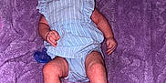 Maxlynn is registered to the contest to win money with this photo: baby, infant, sunglasses, headwrap, blue_outfit, striped_clothing, purple_blanket, pacifier, lying_down, barefoot, cute, sleeping, soft_texture, indoors, child, person, fashion, accessories, newborn, cozy