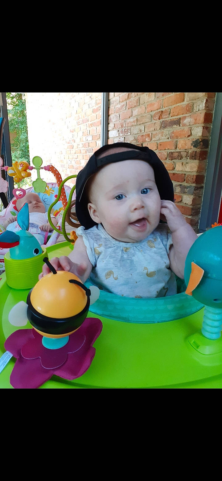 Desiree is registered to the contest to win money with this photo: baby, baby_playing_with_toys, baby_toys, child, headwear, person, play, smile, toddler, toy