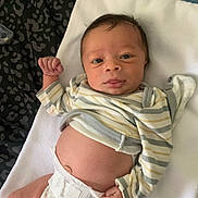 Koa joined the competition — help win amazing prizes! baby, belly, blanket, cute, diaper, eyes, face, fist, hair, hand, indoor, infant, lying_down, newborn, onesie, portrait, smile, soft_lighting, striped_clothing, towel