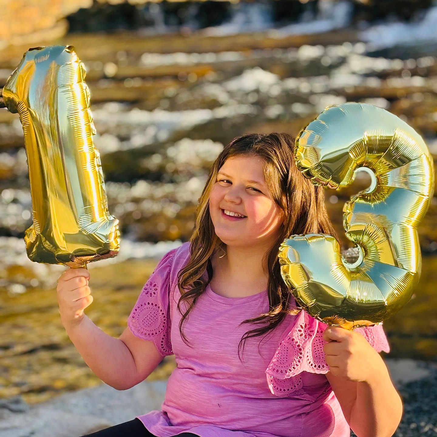 Rosella is registered to the contest to win money with this photo: adult, alcohol, balloon, beer, beverage, blouse, clothing, face, female, happy, head, number, pants, person, photography, portrait, smile, symbol, text, woman