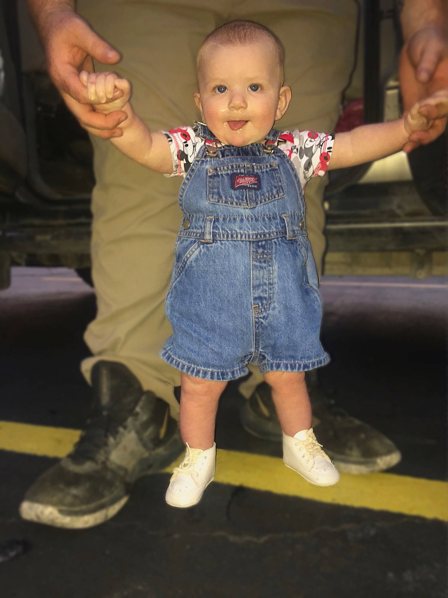 Hendrix is registered to the contest to win money with this photo: child, couch, electric_blue, event, finger, flooring, footwear, fun, gesture, hairstyle, hand, happy, joint, leg, person, skin, sleeve, smile, thumb, toddler