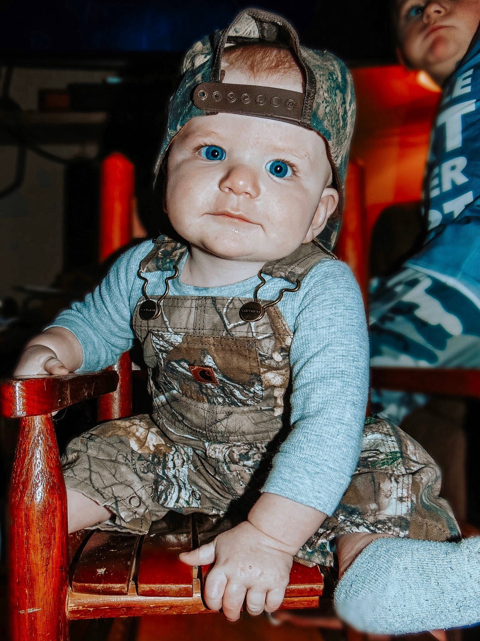 Hendrix is registered to the contest to win money with this photo: baby, baby_toddler_clothing, cap, chair, cheek, child, costume, fashion_accessory, fun, headwear, iris, pattern, person, personal_protective_equipment, portrait_photography, sitting, skin, sleeve, sun_hat, tin_can