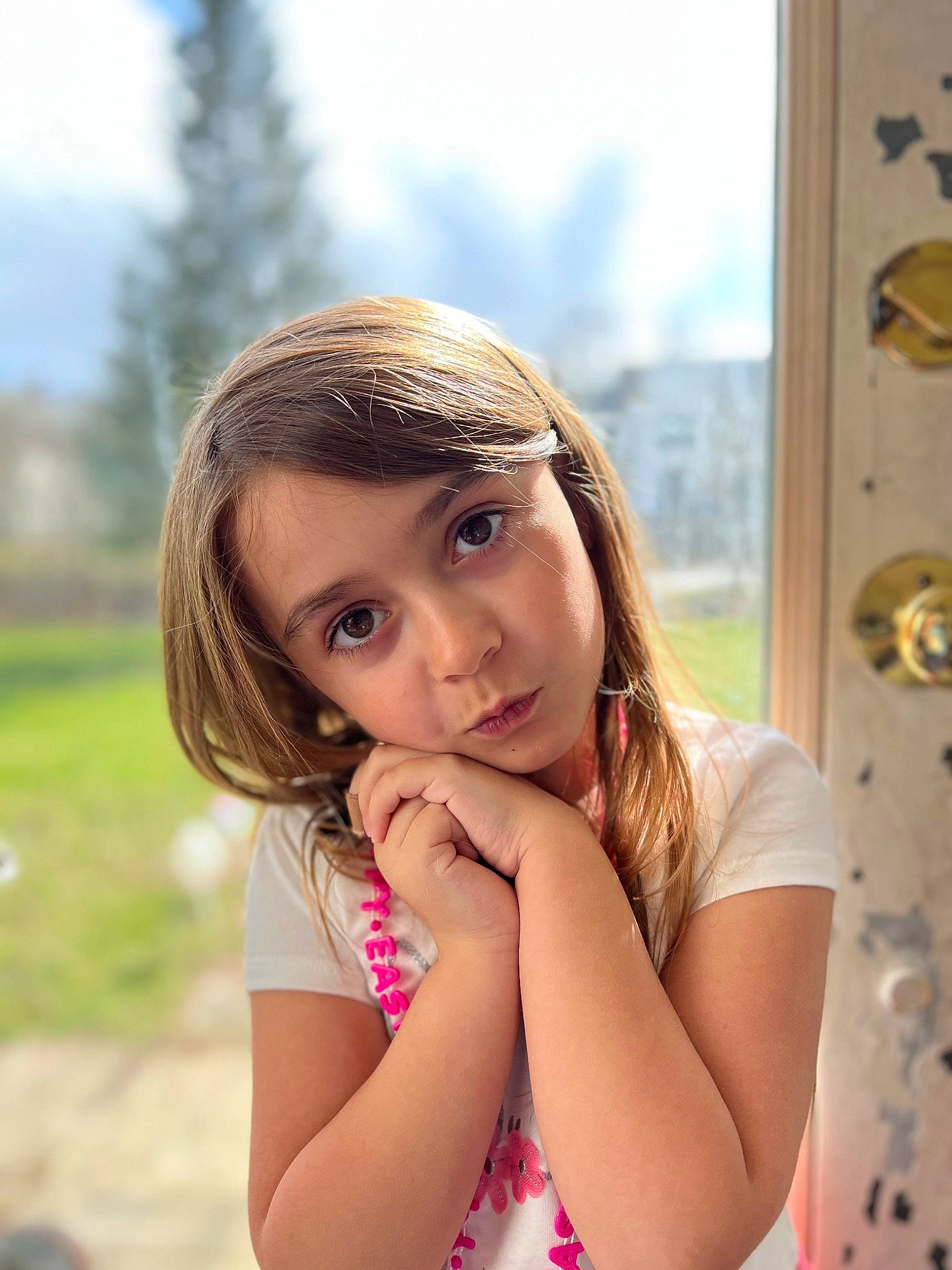 Alexandria is registered to the contest to win money with this photo: blond, brown_hair, child, eyelash, flash_photography, fun, grass, hair, happy, layered_hair, leisure, lip, long_hair, people_in_nature, person, shoulder, sitting, skin, sky, sunlight