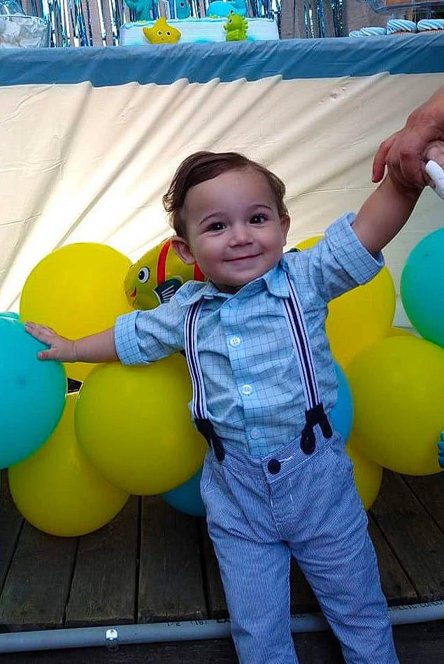 Lancer is registered to the contest to win money with this photo: balloon, beauty, blue, child, electric_blue, face, fun, gesture, green, happy, joy, leisure, party_supply, person, photograph, playground, recreation, smile, snapshot, toddler