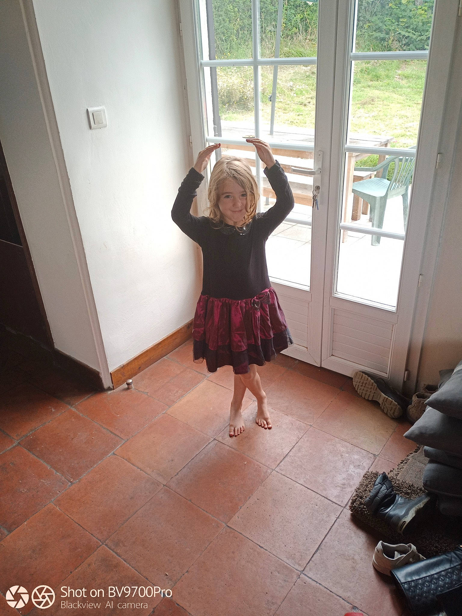 Saphyra a rejoint le concours — aidez-le/la à gagner de superbes lots ! dress, floor, flooring, happy, hardwood, house, human_leg, joy, knee, laminate_flooring, leg, long_hair, mammal, pattern, person, thigh, toddler, trunk, waist, window