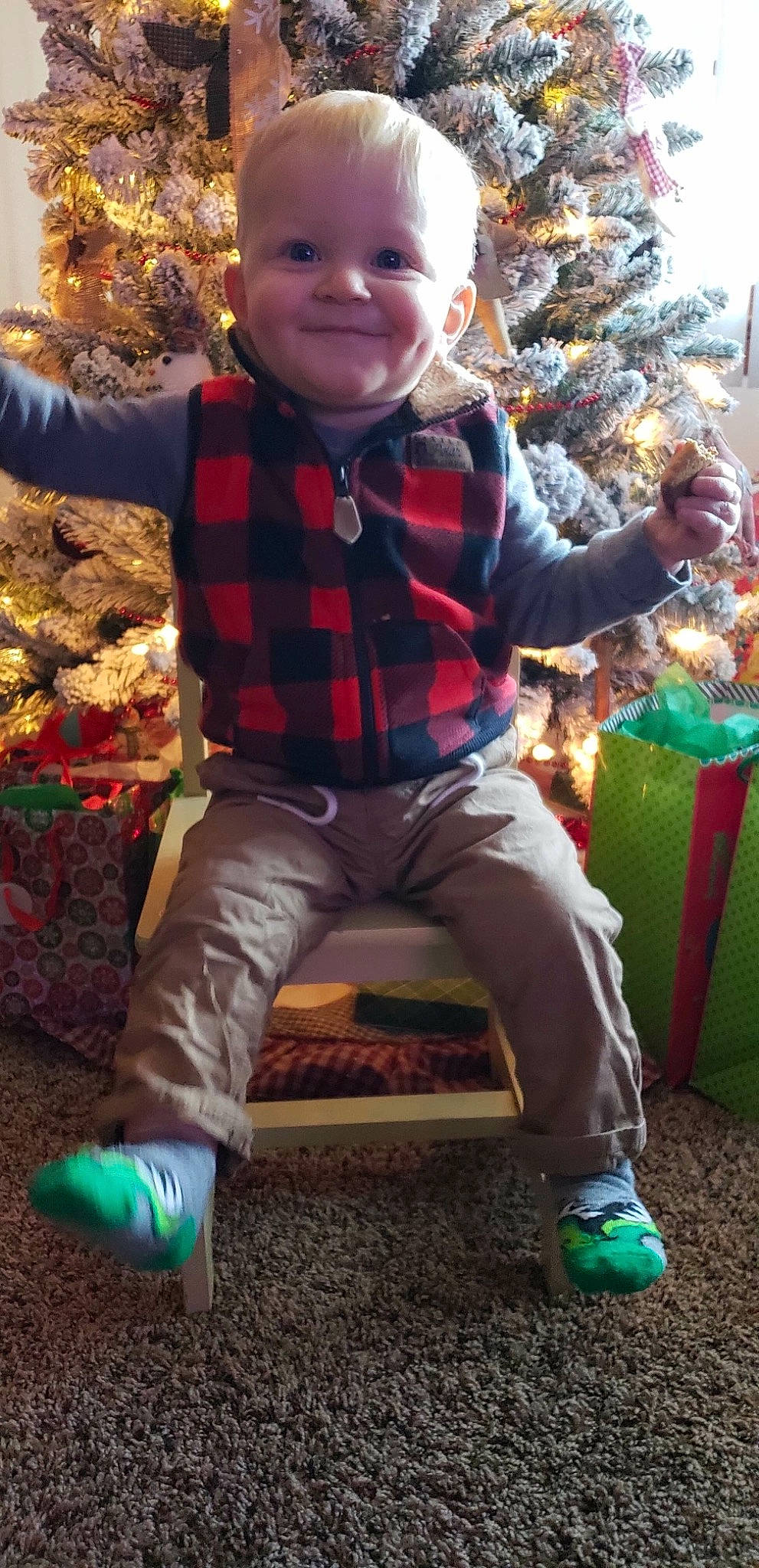 Johnathan is registered to the contest to win money with this photo: child, day, fun, grass, holiday, infant, person, play, product, toddler, tree