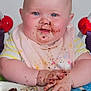Gracie-May is registered to the contest to win money with this photo: baby, child, messy, chocolate, cake, bib, highchair, blue_eyes, happy, smiling, food, hands, face, indoor, toy, activity_center, red, purple, yellow, pink