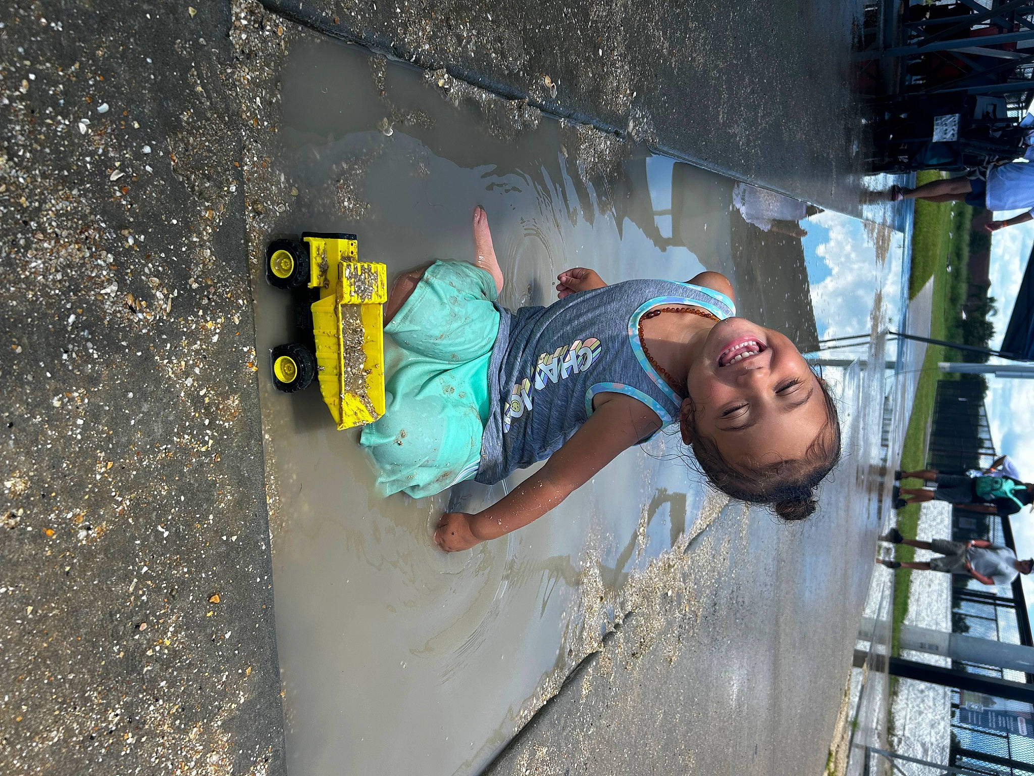 Stella joined the competition — help win amazing prizes! art, asphalt, automotive_tire, child, city, concrete, fun, joy, leisure, pedestrian, person, road, road_surface, sidewalk, smile, soil, street, t_shirt, tar, tire