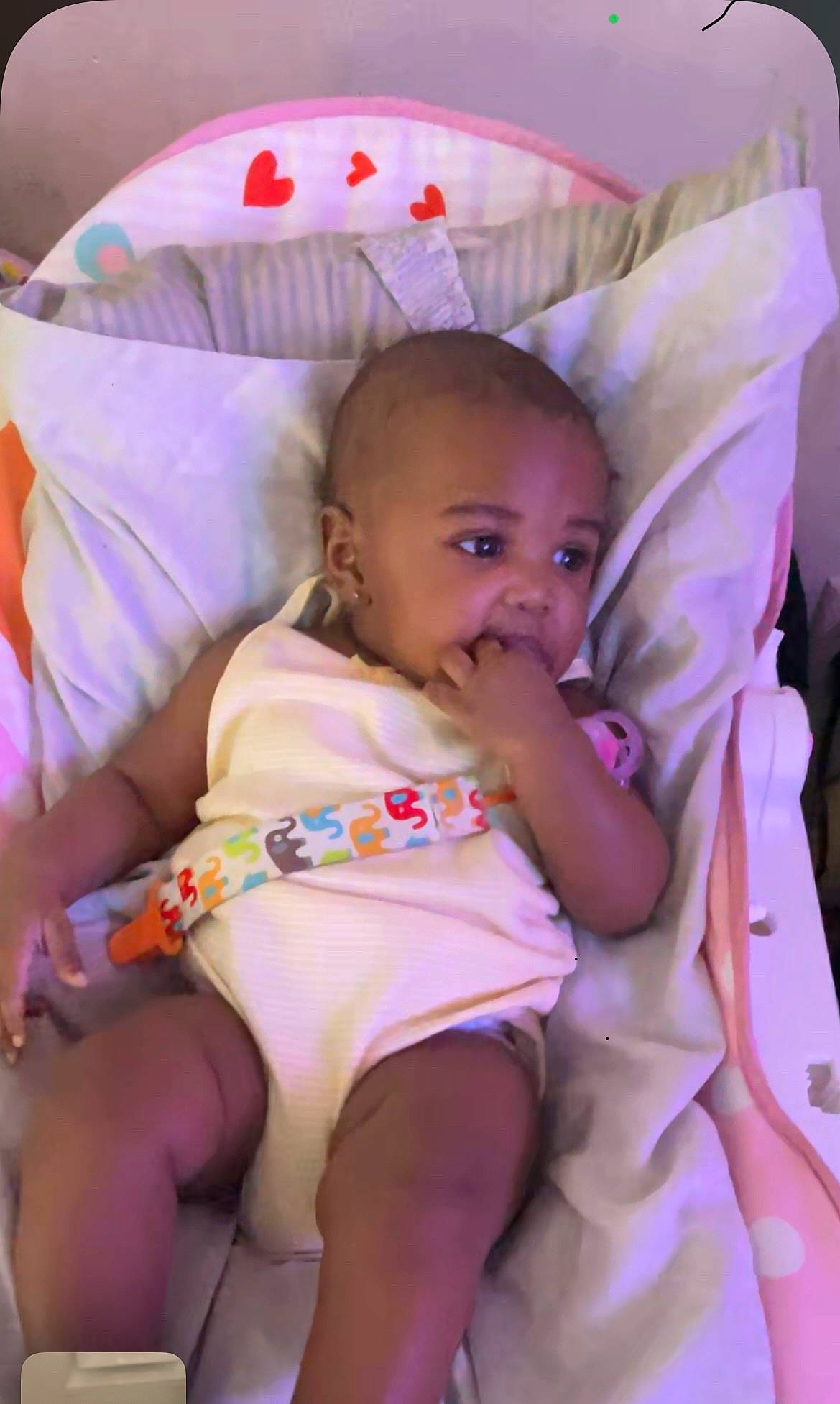 Cristiana is registered to the contest to win money with this photo: abdomen, baby, baby_toddler_clothing, child, comfort, eye, finger, fun, happy, linens, magenta, mouth, person, pink, purple, skin, smile, textile, thigh, toddler