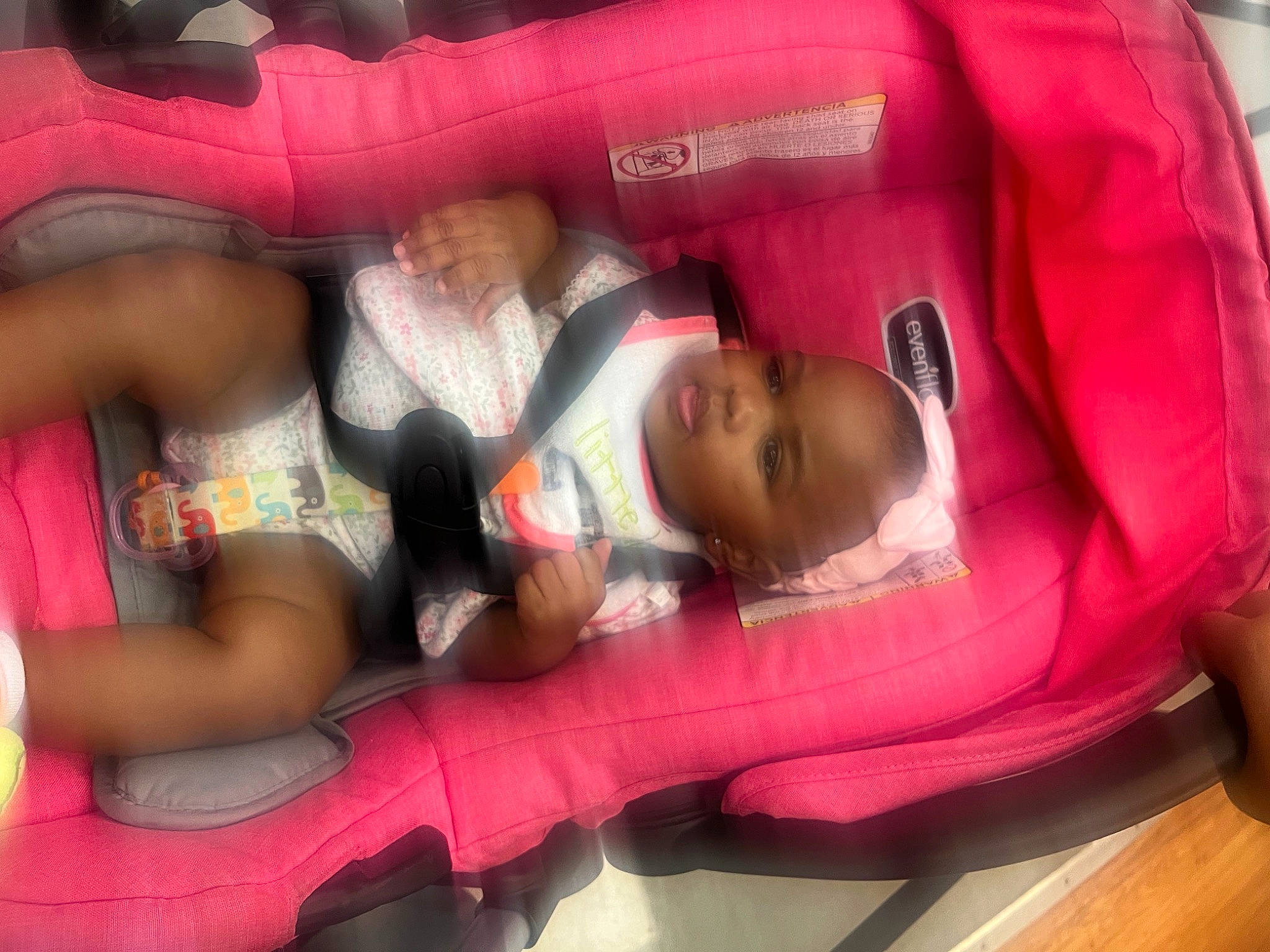 Cristiana joined the competition — help win amazing prizes! baby_products, bounce_house, car_seat, child, comfort, event, facial_expression, fun, human_body, human_leg, inflatable, lap, leisure, magenta, person, pink, play, recreation, room, thigh