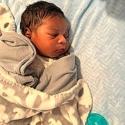 Kahmari is registered to the contest to win money with this photo: newborn, baby, sleeping, blanket, cozy, pacifier, infant, soft, wrapped, cute, peaceful, child, bed, fabric, comfort, toddler, portrait, face, person, rest