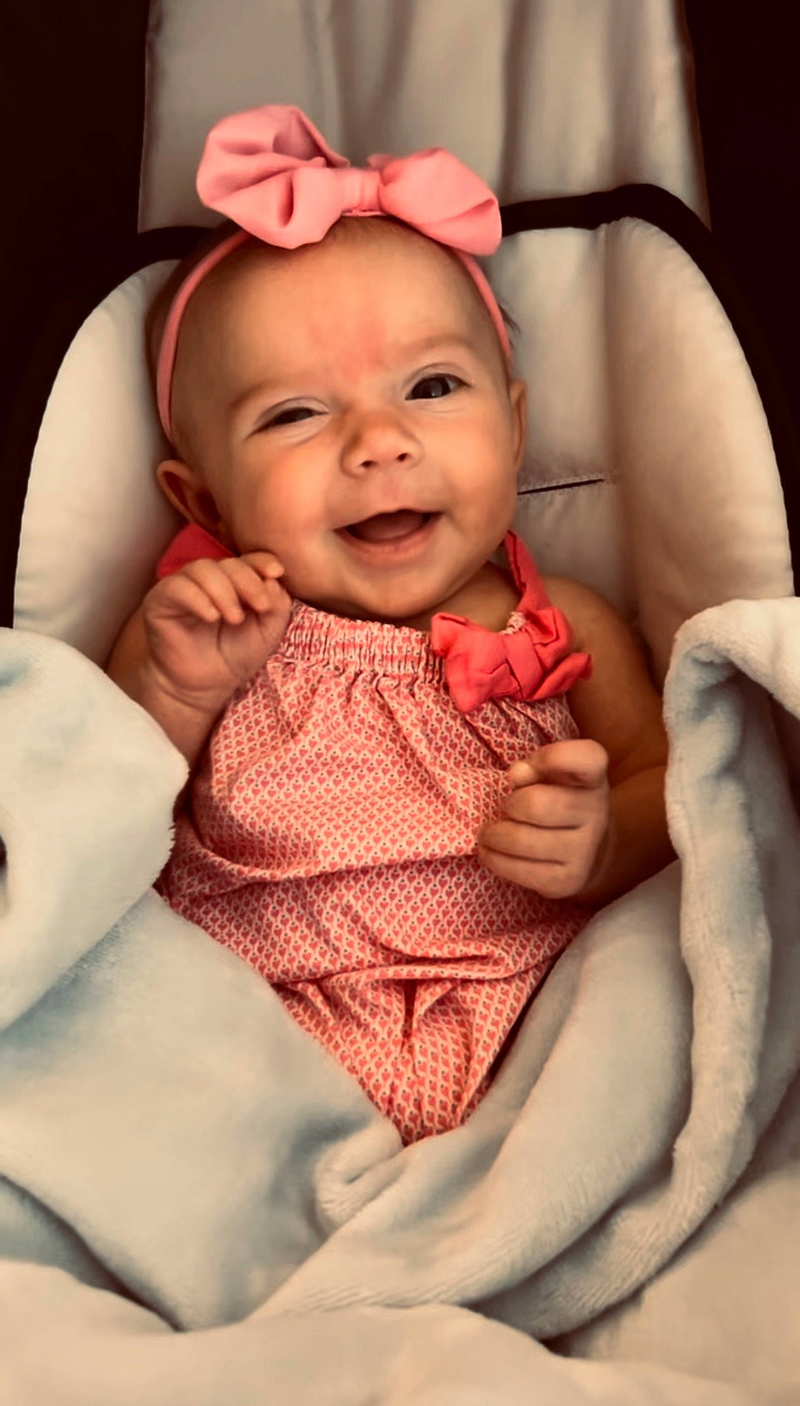 Harper Rose is registered to the contest to win money with this photo: arm, baby, baby_toddler_clothing, cheek, chin, comfort, eye, eyebrow, face, facial_expression, hand, human, lip, mouth, muscle, nose, person, skin, sleeve, smile