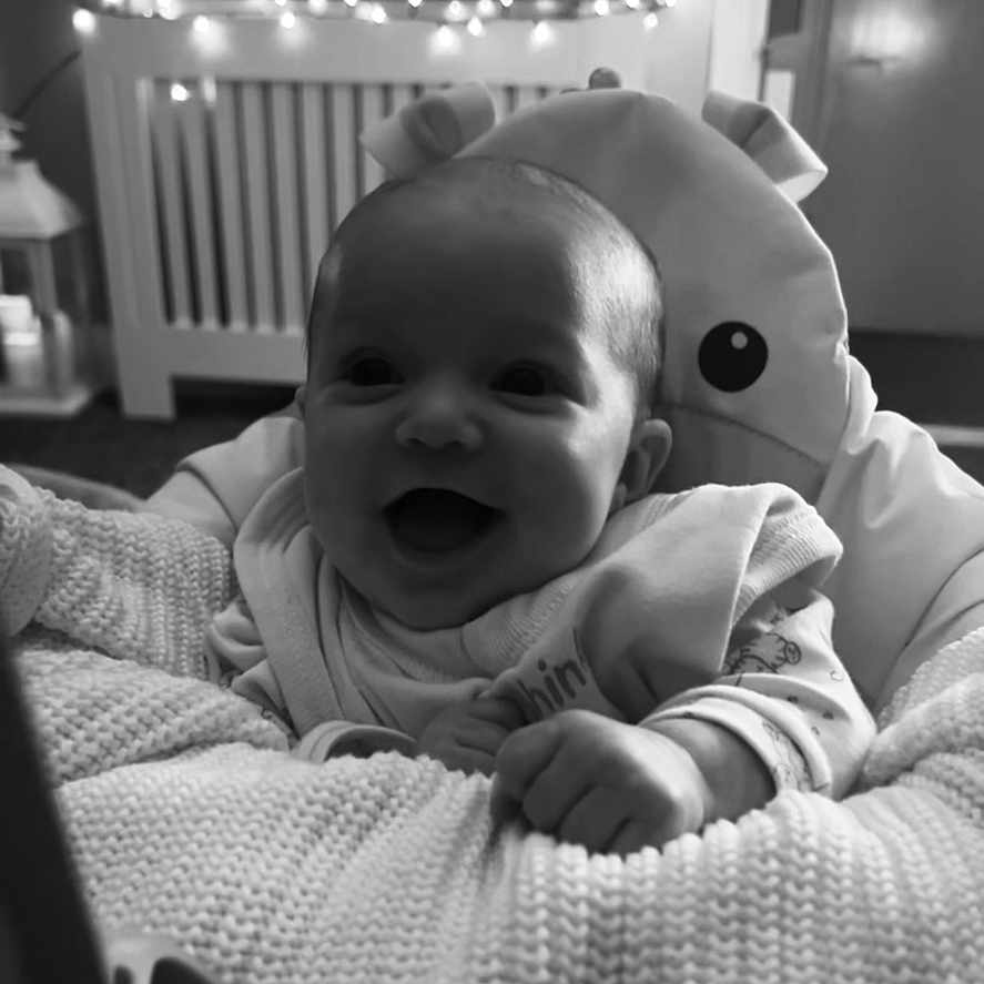 River-Rose joined the competition — help win amazing prizes! baby, bed, bodypart, couch, crib, cushion, face, finger, furniture, hand, happy, head, homedecor, indoors, infantbed, laughing, newborn, person, photography, portrait