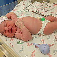 Isaiah joined the competition — help win amazing prizes! newborn, baby, hospital, bassinet, blanket, footprint_pattern, diaper, hat, umbilical_clamp, bulb_syringe, infant, medical, patient, bed, skin, wrinkled_hand, sleeping, healthcare, cute, child