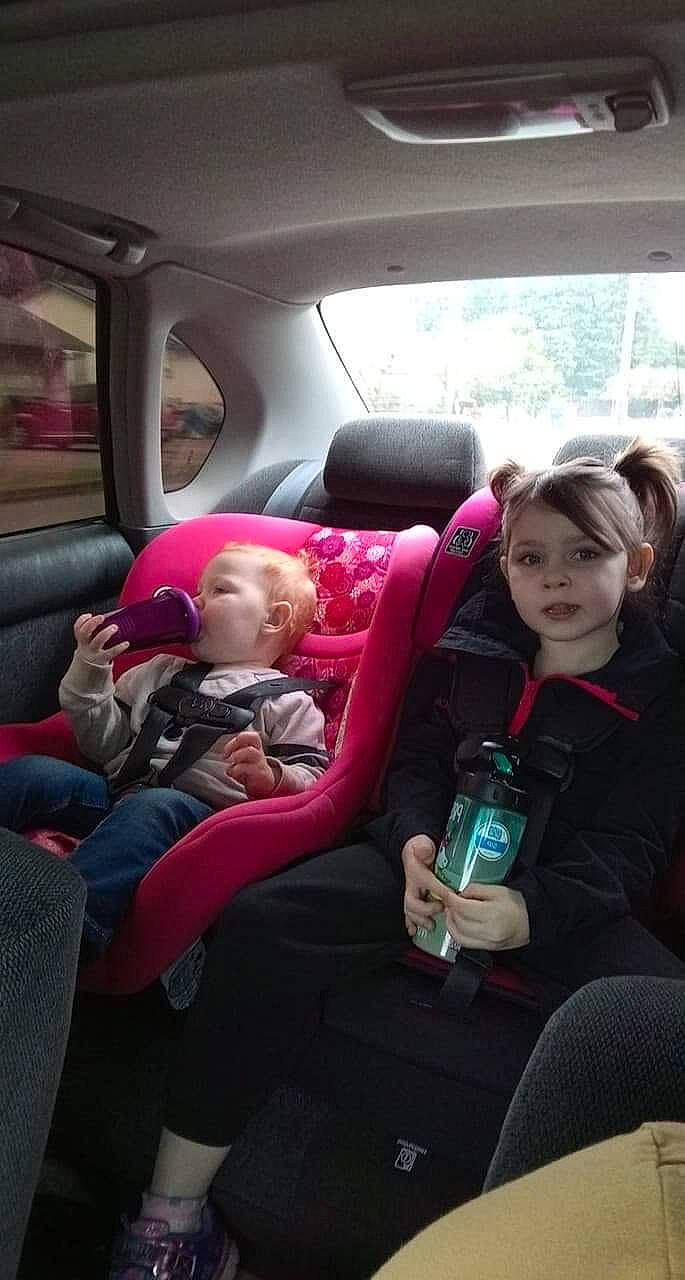 Lillian is registered to the contest to win money with this photo: auto_part, baby, car, car_seat, child, driving, family_car, fun, luxury_vehicle, passenger, person, sitting, toddler, vacation, vehicle