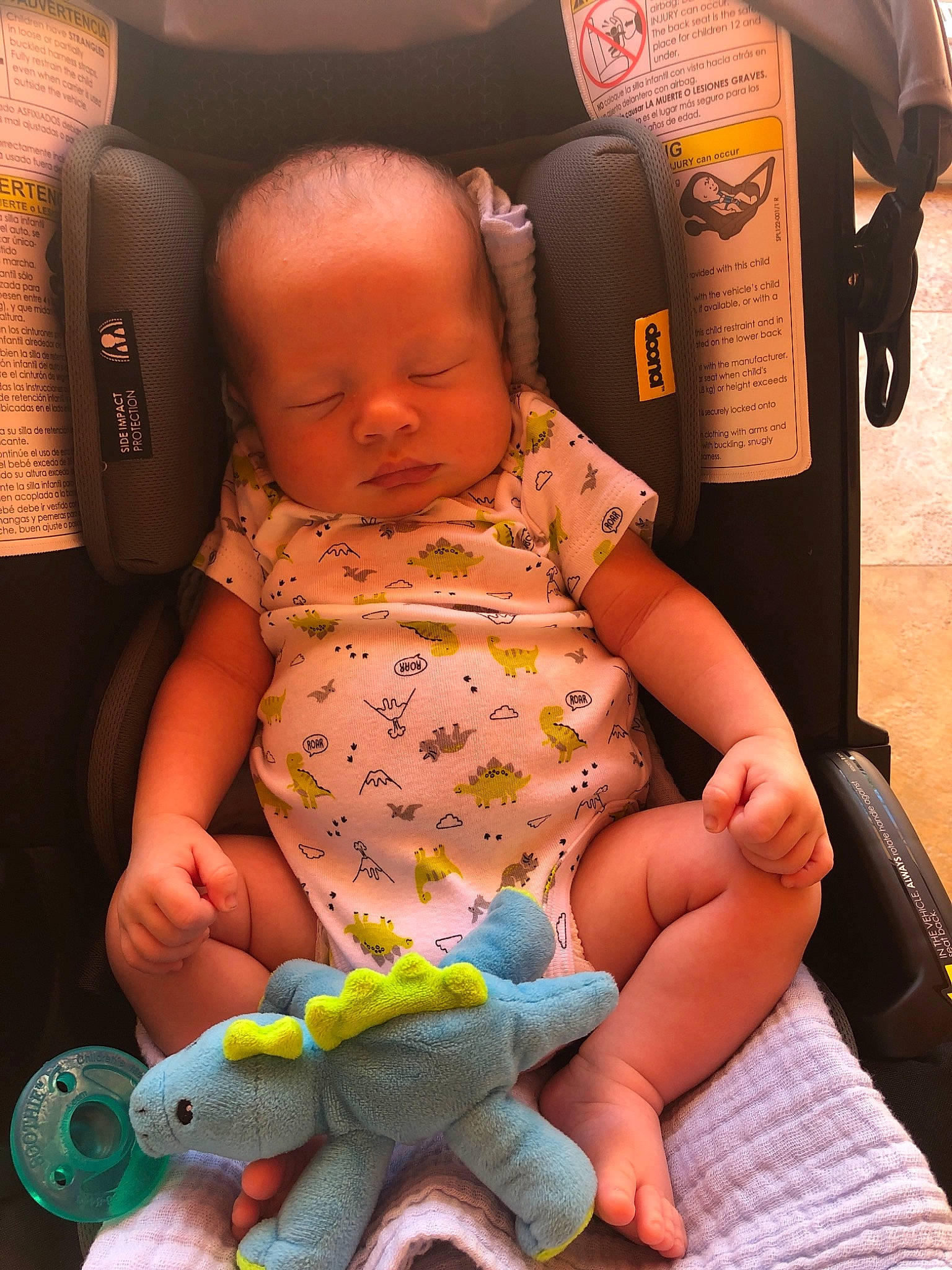 Krew is registered to the contest to win money with this photo: arm, baby, baby_carriage, baby_in_car_seat, baby_products, car_seat, child, ear, finger, hand, leg, nail, person, play, product, sitting, skin, toddler