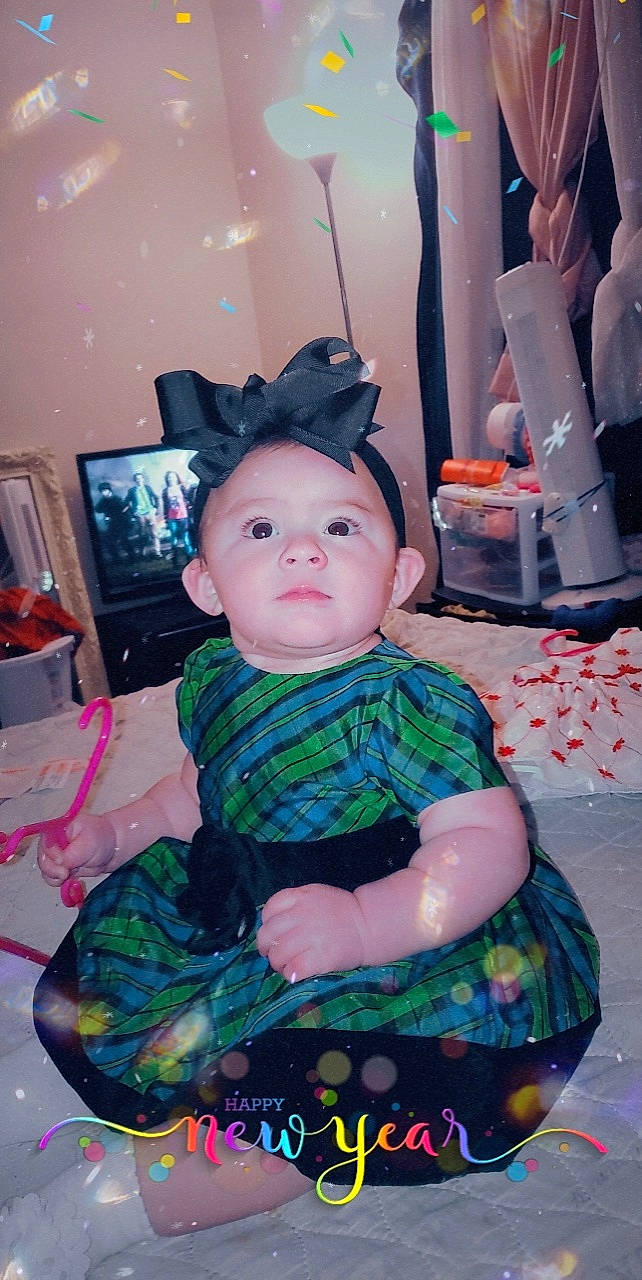 Marissa joined the competition — help win amazing prizes! baby_toddler_clothing, beauty, carmine, child, costume_hat, day_dress, dress, event, fashion, fashion_design, fun, hat, holiday, pattern, person, picture_frame, pink, purple, sitting, toddler